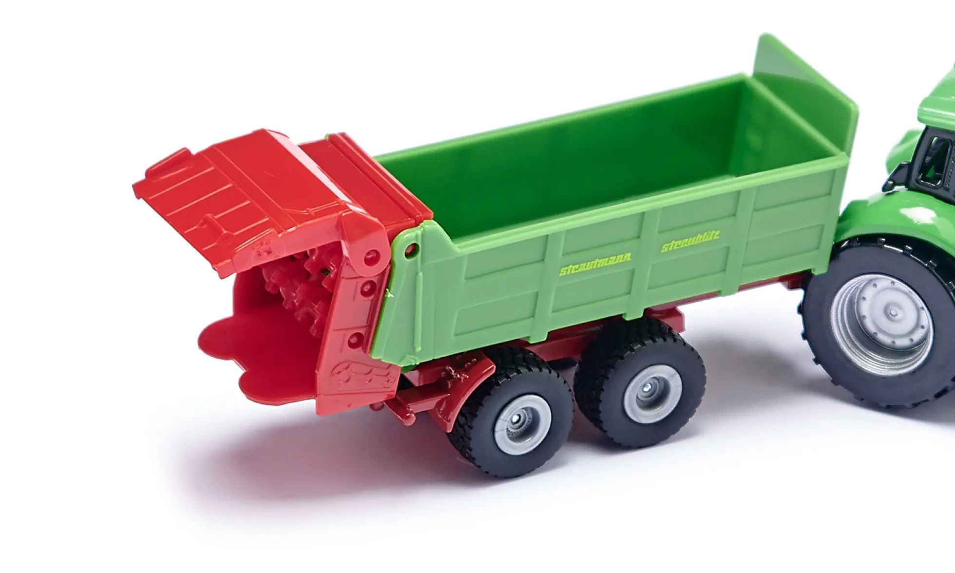 DEUTZ-FAHR mit Strautmann Universalstreuer