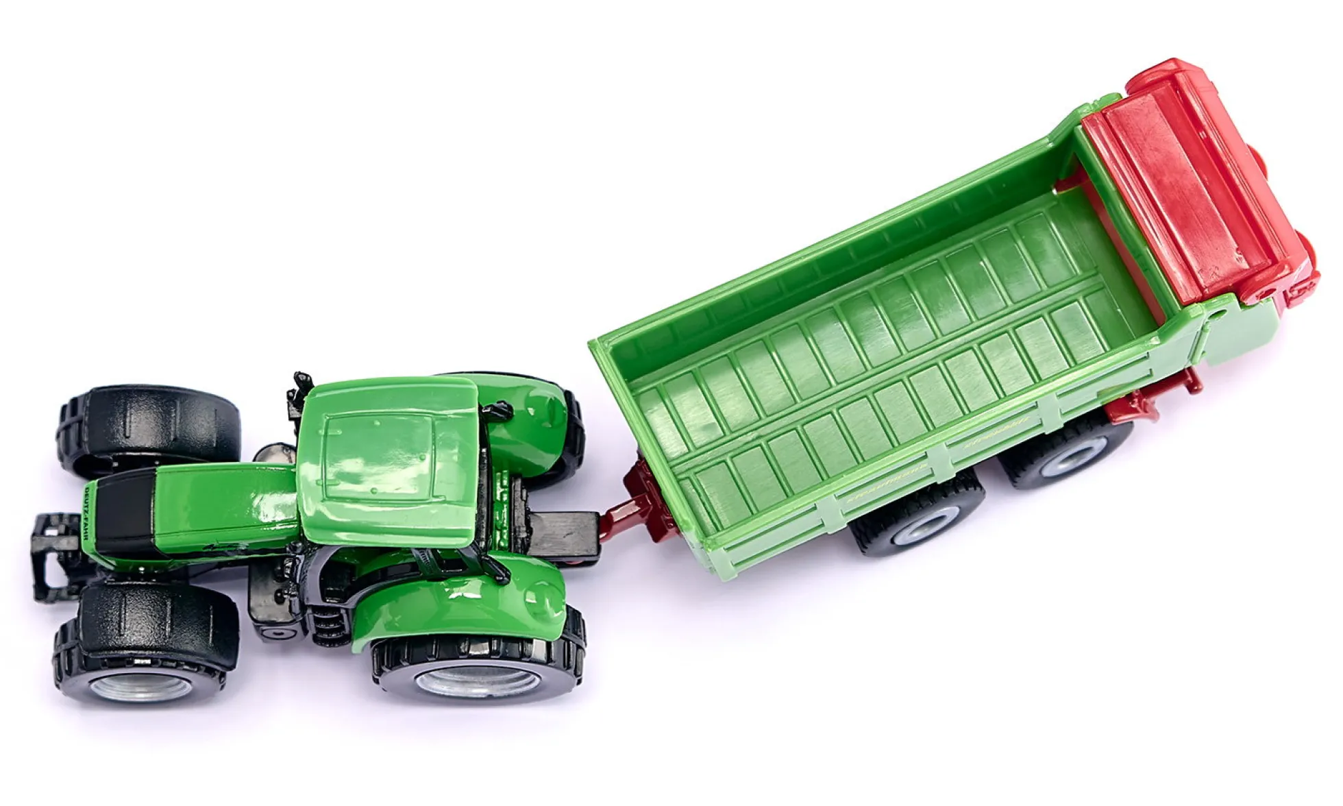 DEUTZ-FAHR mit Strautmann Universalstreuer