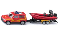 Land Rover Defender mit Boot